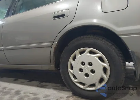 1999 Toyota Camry Le from USA, damaged, VIN 4T1BG22K3XU556347